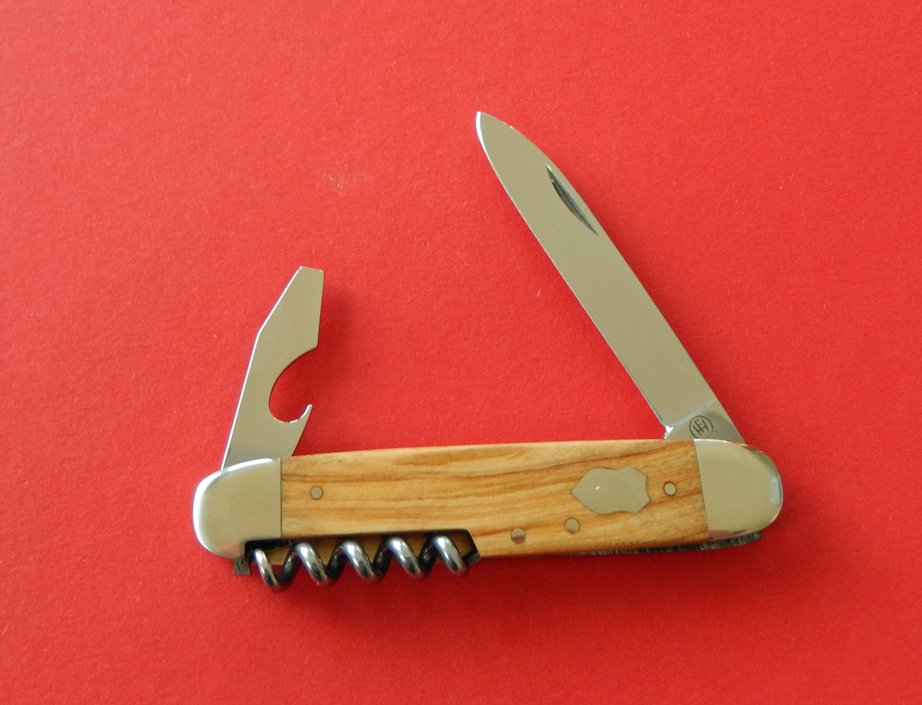 Hartkopf-Solingen Taschenmesser- 7,5 cm rostfrei, Korkenzieher, Kombiwerkzeug, Olivenholz bei ISS
