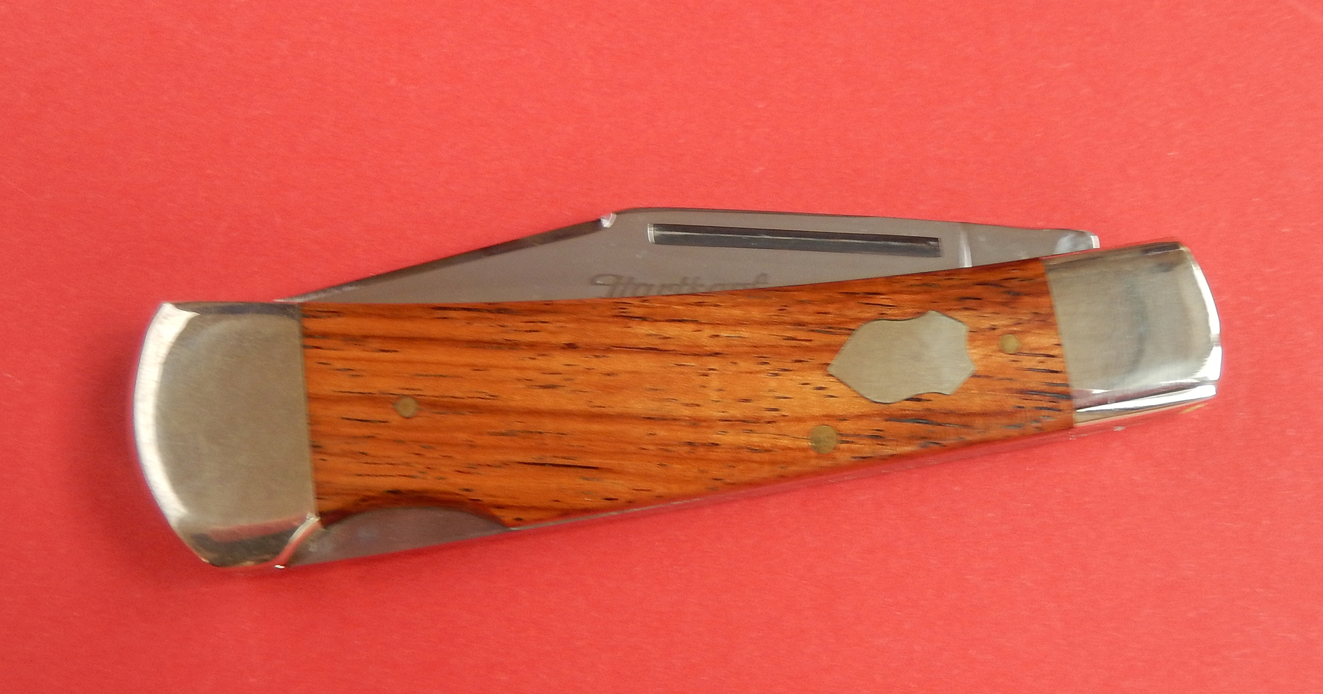 Hartkopf Taschenmesser Olivenhalz Hechtklinge aus rostfreiem 1.4034 Stahl.