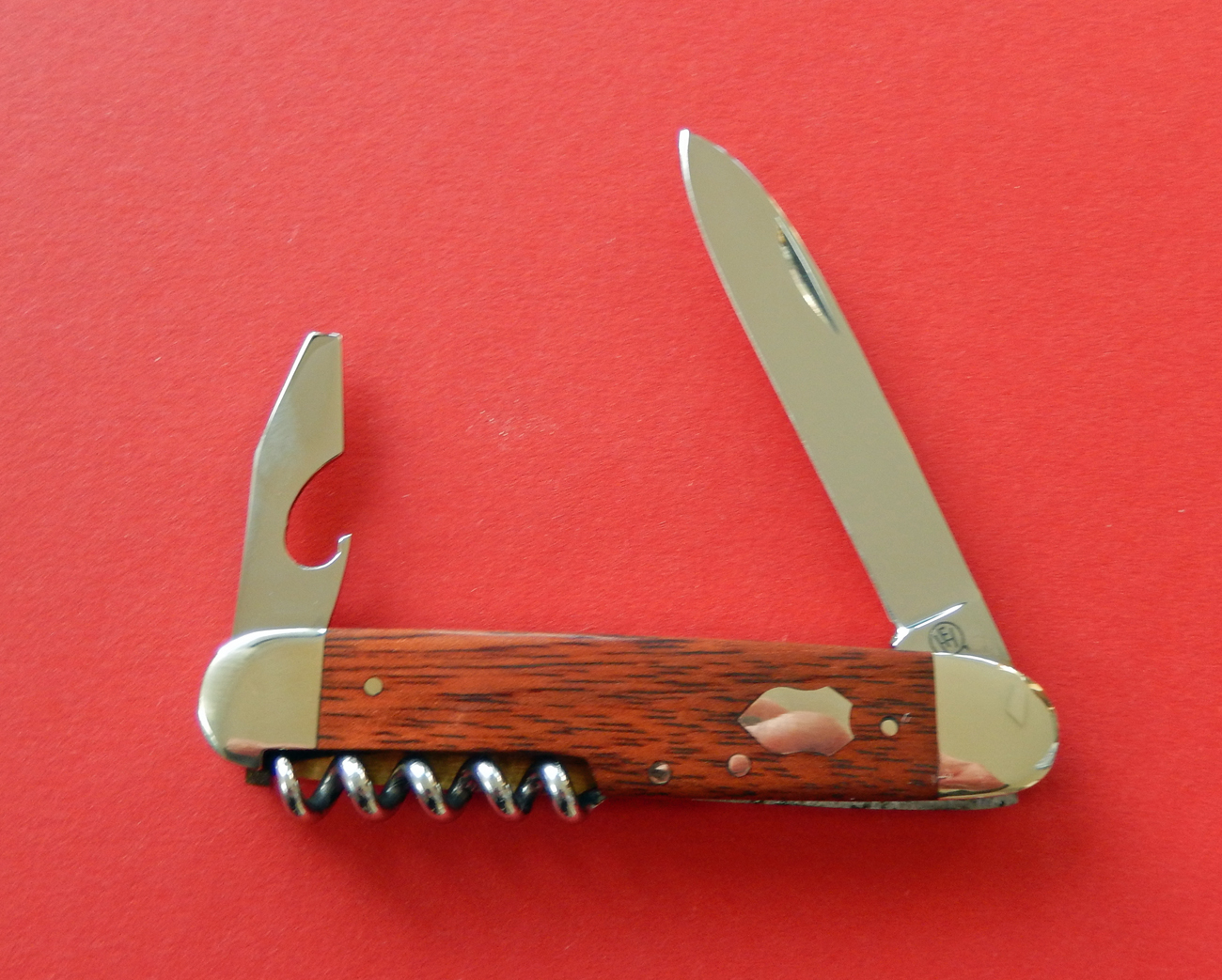 Taschenmesser 7,5 cm rostfrei, Korkenzieher, Kombiwerkzeug, Rotholz von F.Hartkopf bei ISS